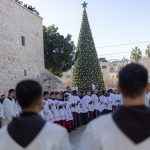 Thousands attend Christmas tree lighting ceremony in Bethlehem, the first since war in Gaza began